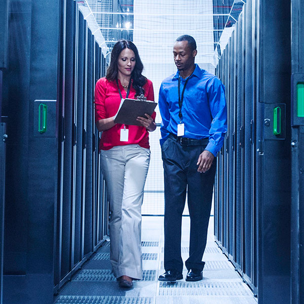 Male and female data center workers